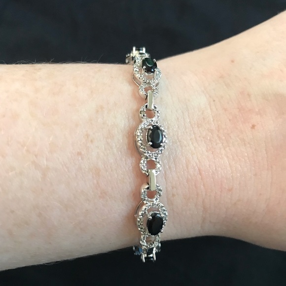 Sterling silver bracelet with black oval stones and diamonds, from Macy’s. - Picture 1 of 4